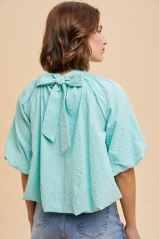 TEXTURED BACK BOW TOP