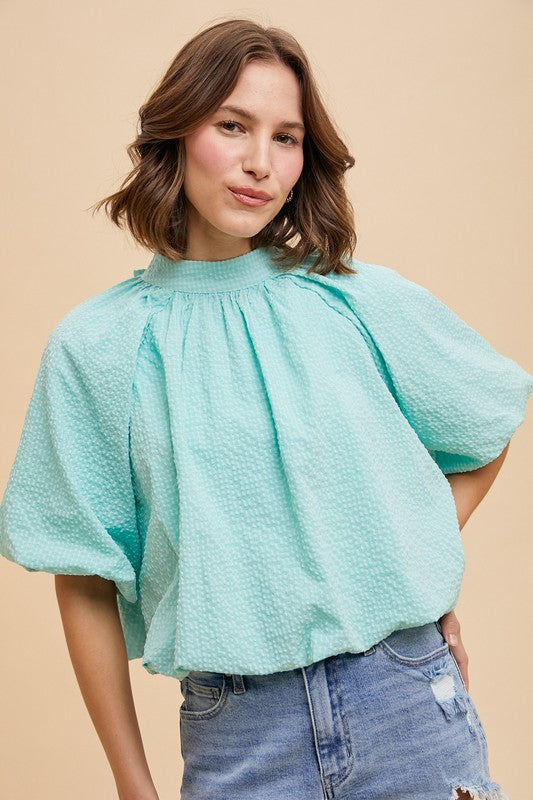 TEXTURED BACK BOW TOP