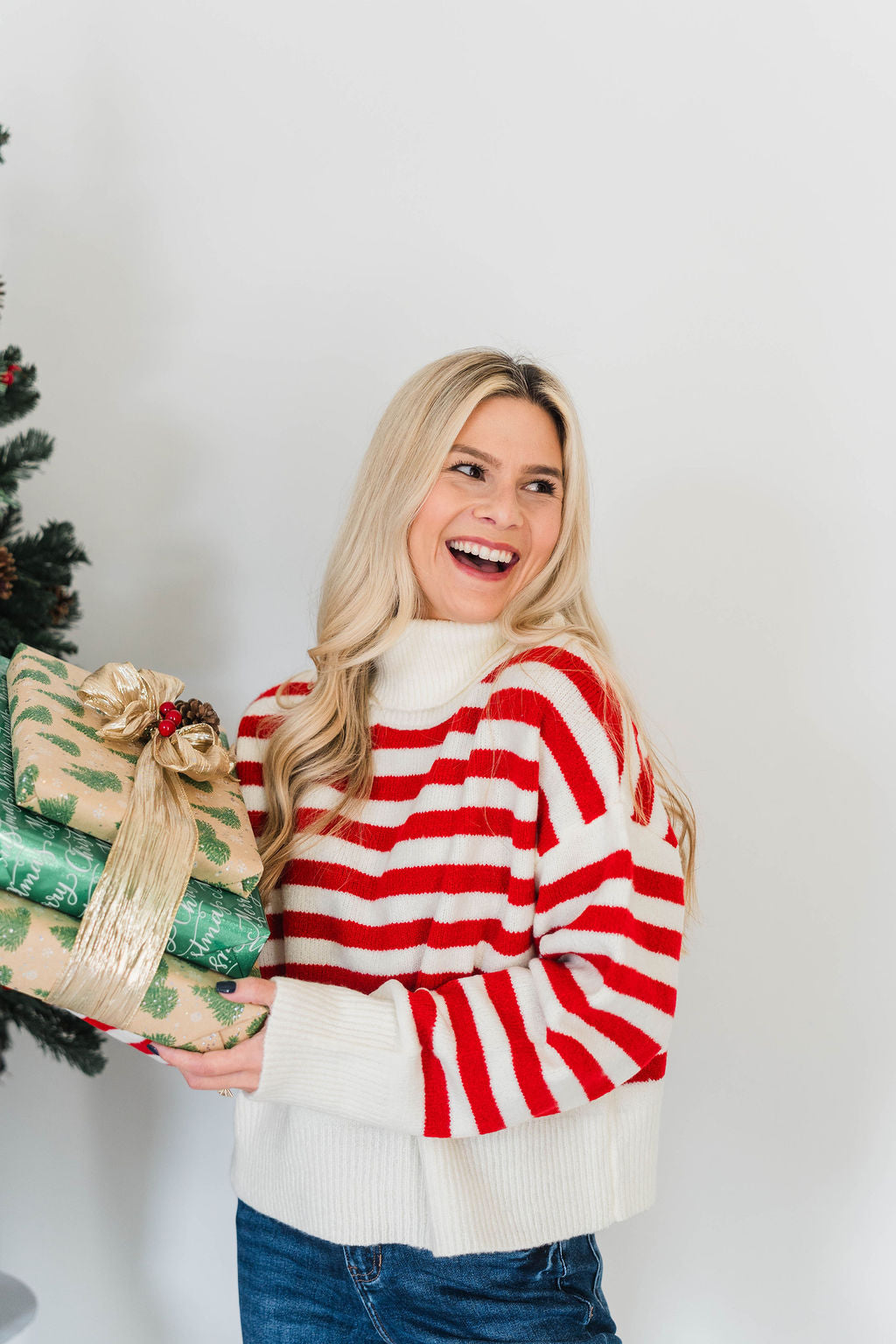 CANDY STRIPED TURTLENECK SWEATER