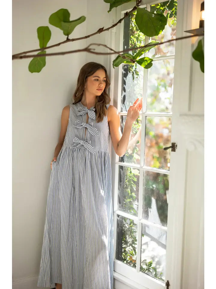 STRIPED DRESS WITH FRONT BOW DETAIL